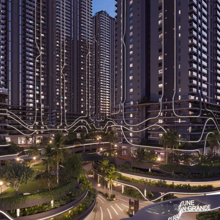 Fortune Suraj Bhan Grande podium gardens and tower bases lit at night